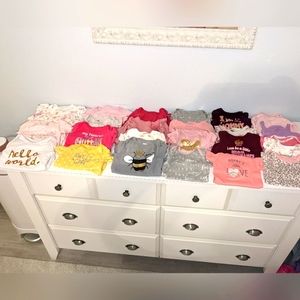 Bundle of 25 Baby Girl Size 6-9 Onesies. Worn once each. Like new. No stains.